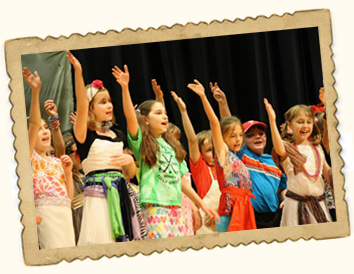 Children on stage at THEATERWEEK